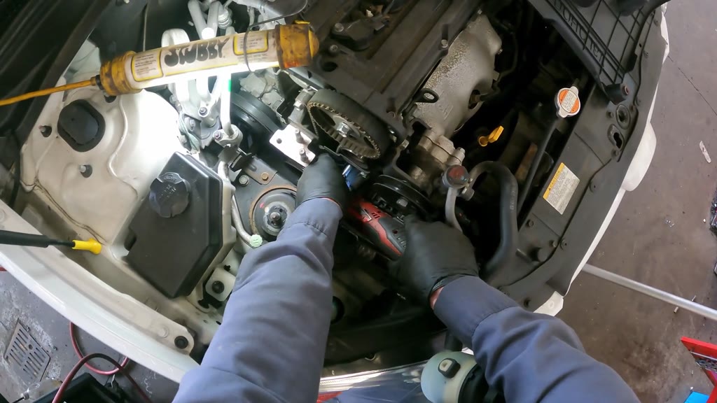 Step 8: Loosen the engine-side bracket attachments