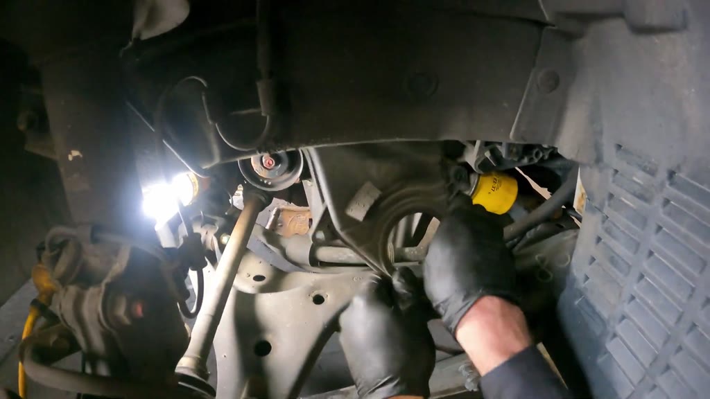 Step 12: Remove the lower timing-belt cover