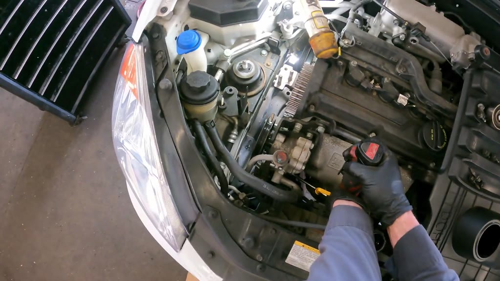 Step 19: Release the water-pump mounting fasteners