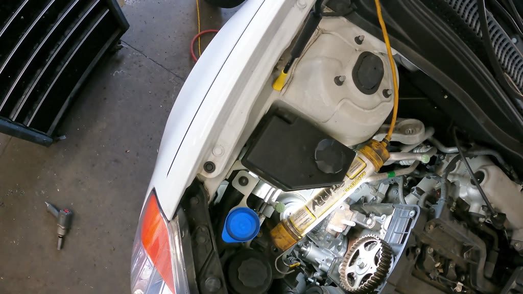 Step 25: Seat the replacement pump and start its mounting fastener