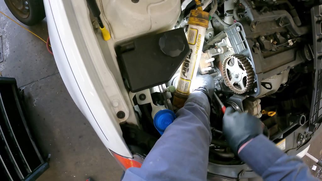 Step 26: Secure the replacement water pump