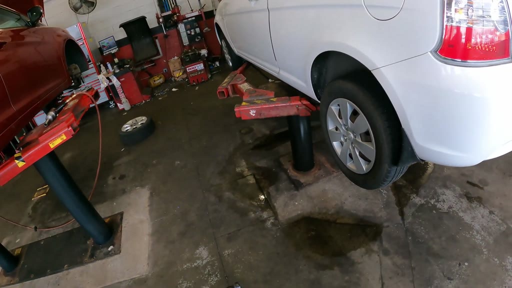 Step 33: Lower the vehicle for upper-engine access