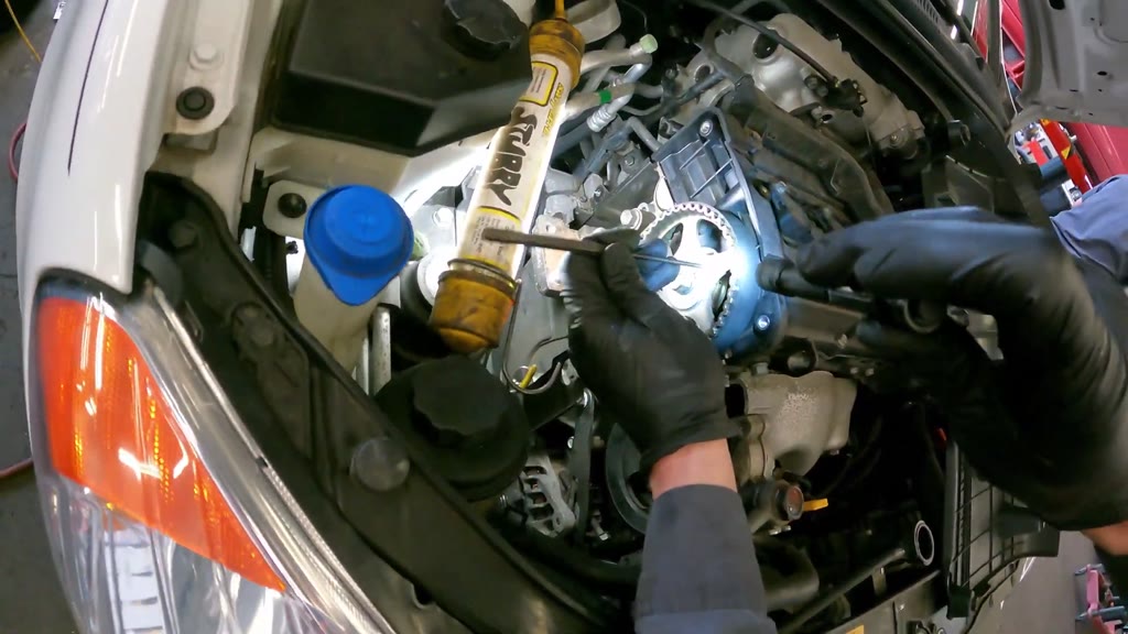 Step 34: Secure the upper timing-side hardware and inspect the references