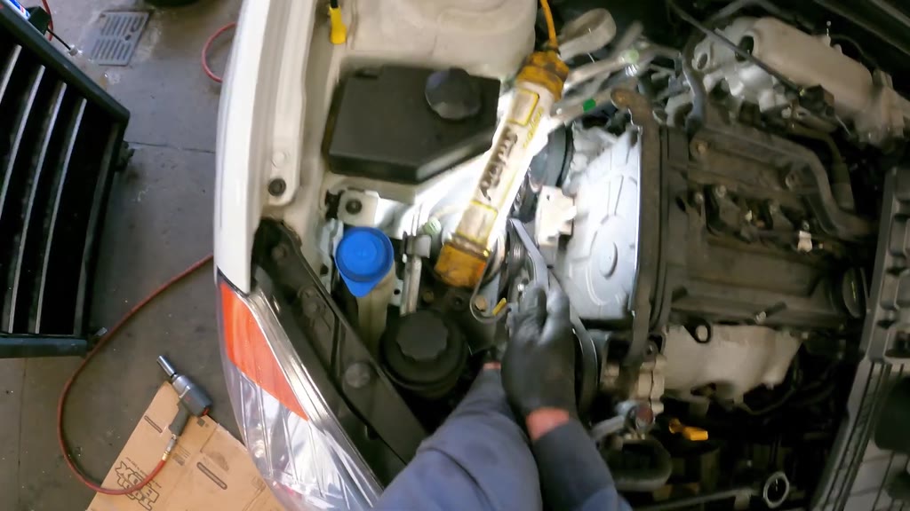 Step 36: Install the shared-hub accessory pulleys and belts
