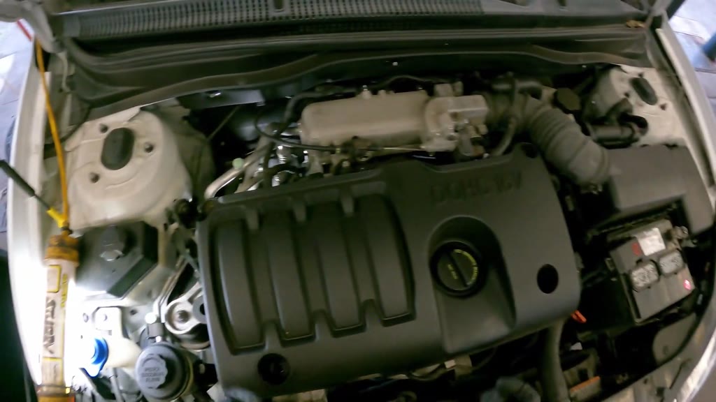 Step 39: Install the DOHC 16V engine trim cover