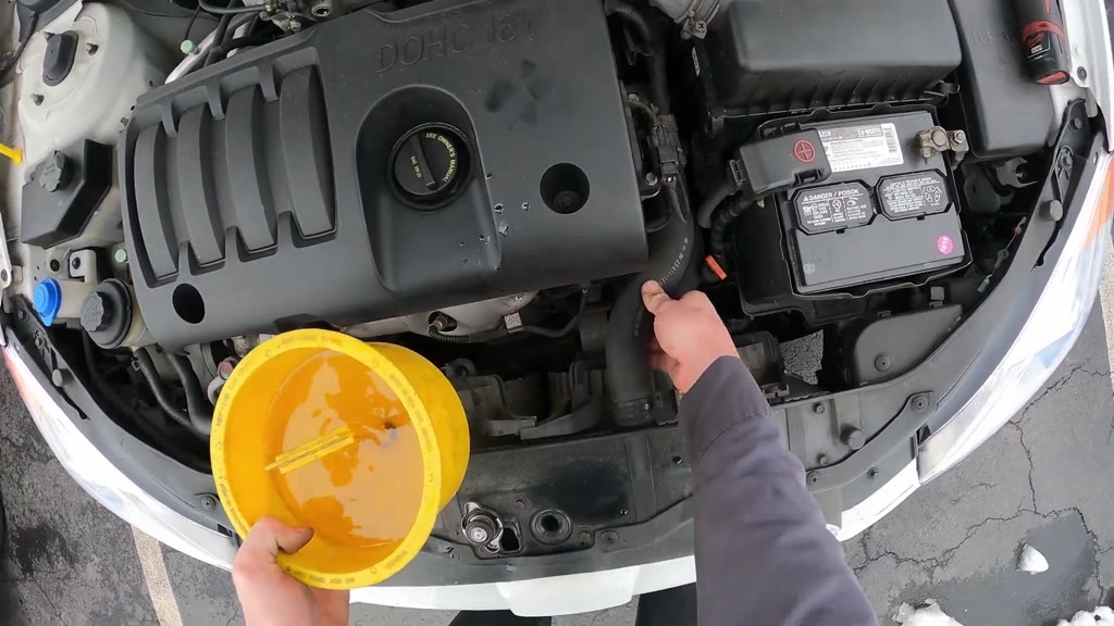 Step 46: Remove the coolant funnel and reinstall the radiator cap